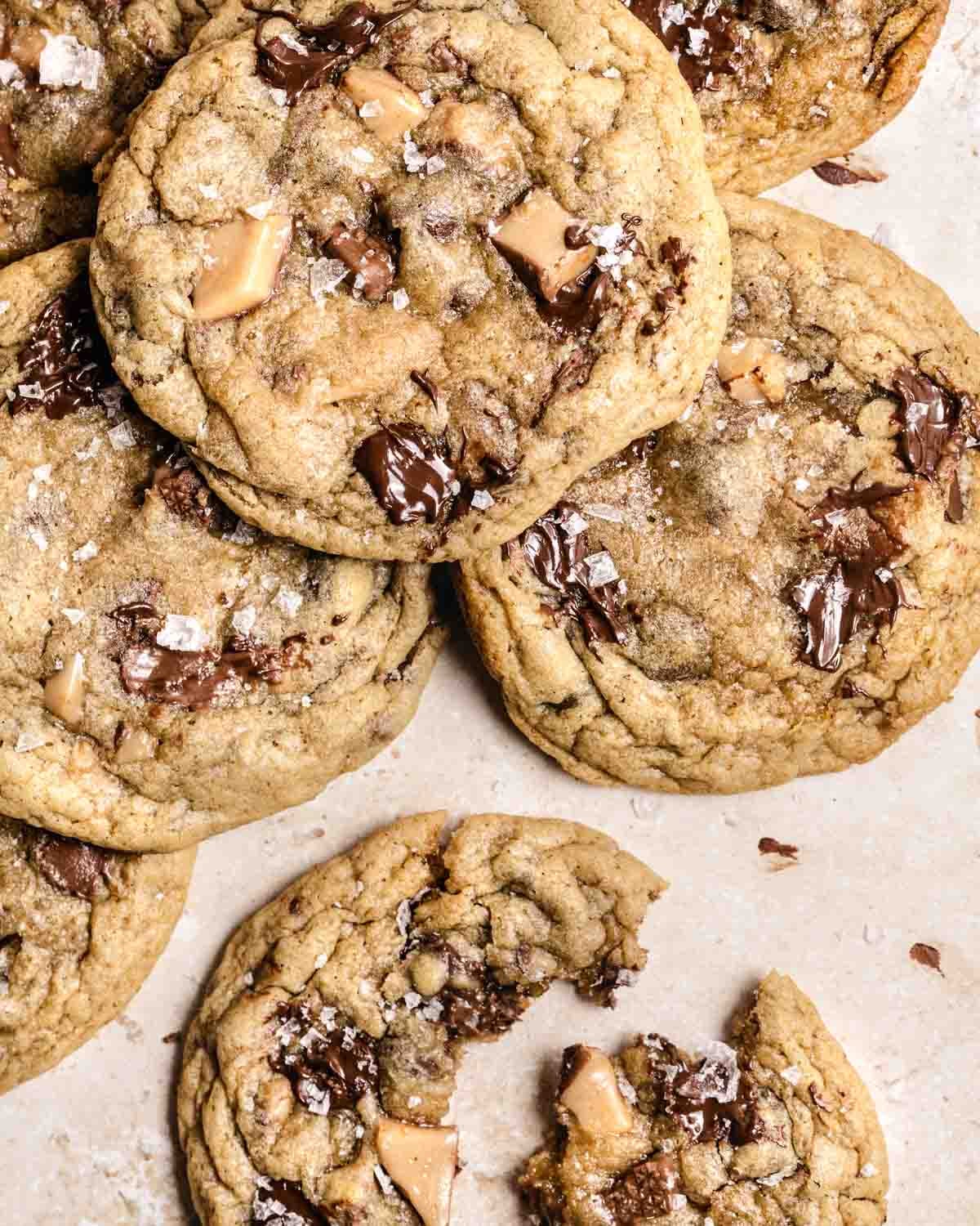 Close-up of chocolate chip cookies with chunks and melted chocolate.